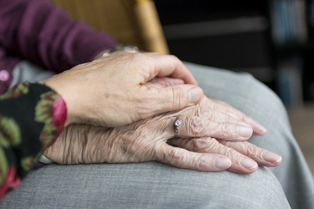 older hands and younger hands
